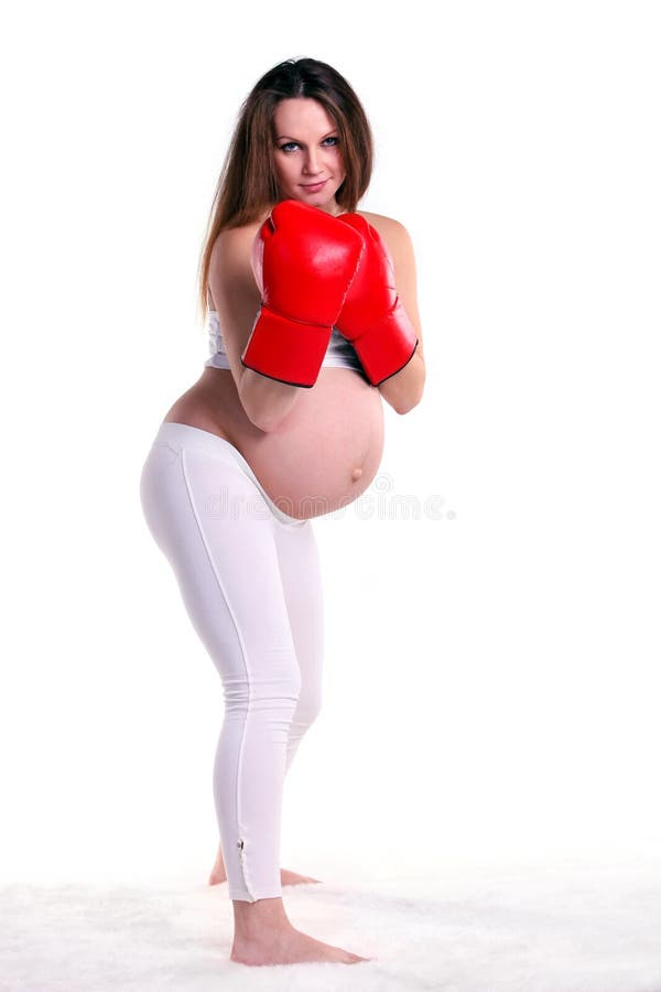 boxninghandskar parar gravid kvinnabarn royaltyfria bilder boxninghandskar parar gravid kvinnabarn royaltyfria bilder