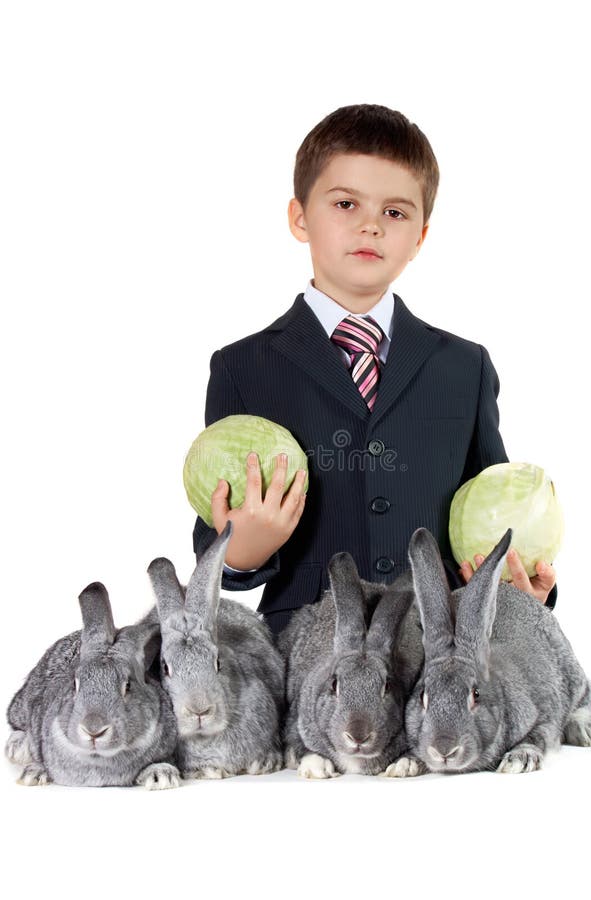 Lad with rabbits stock photo. Image of embracing, fluffy 17163028