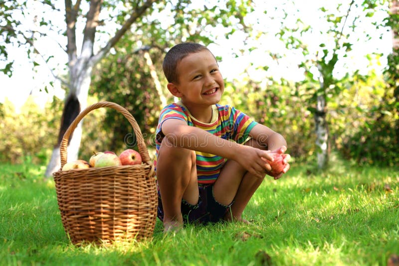 Boy with apples