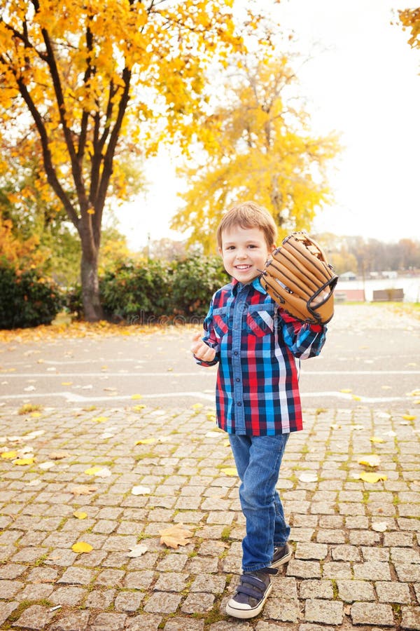Boy with a baseball glove stock image. Image of playing 66140969