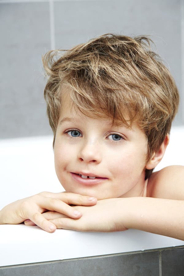 Boy in bath playing stock image. Image of studio, bathroom 52505361