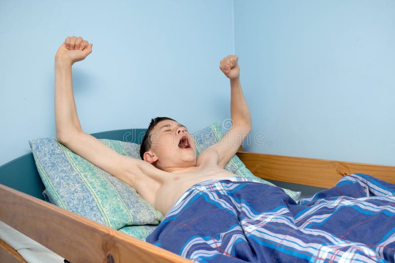 Teens Amateur Webcam - Boy in bed stock image. Image of morning, sleeping, waking - 101187521