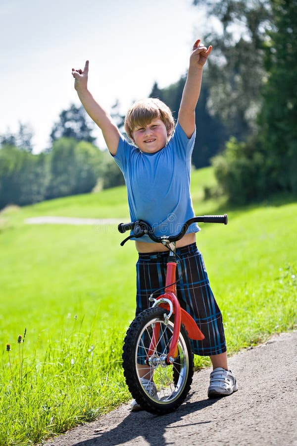 Boy with a bicycle stock photo. Image of smiling, activity 25365996