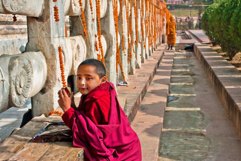 Boy from the buddhist monastery play near the Temp royalty free stock photos