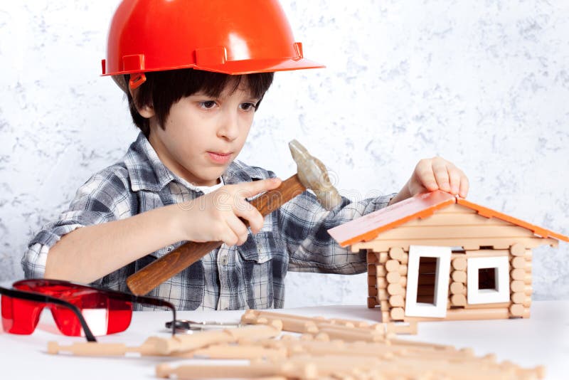 Boy built a new house stock photo. Image of little, helmet 41989874
