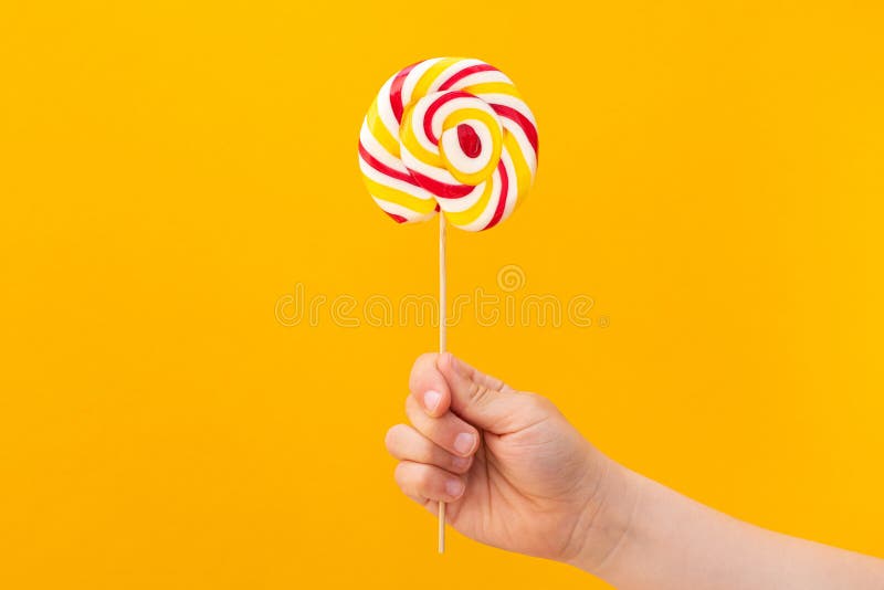 Boy Child Hand Holding Tasty Lollipop Stock Image - Image of people ...