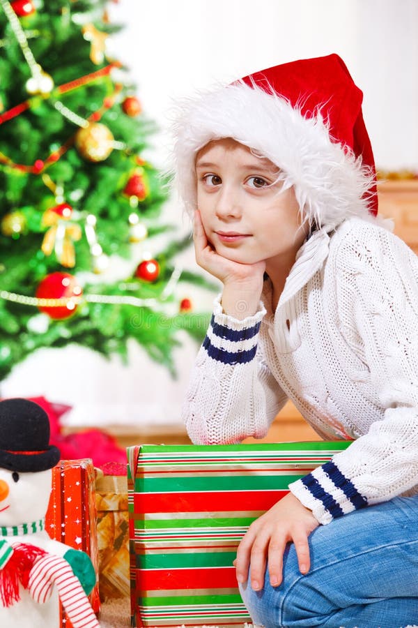 Boy in Christmas hat stock photo. Image of december, sweet 27437228