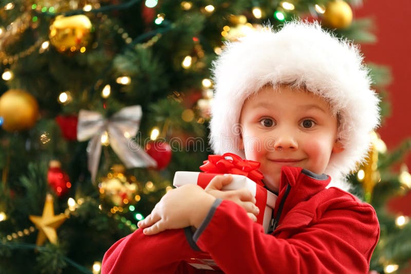 Boy with Chritmas gift stock image