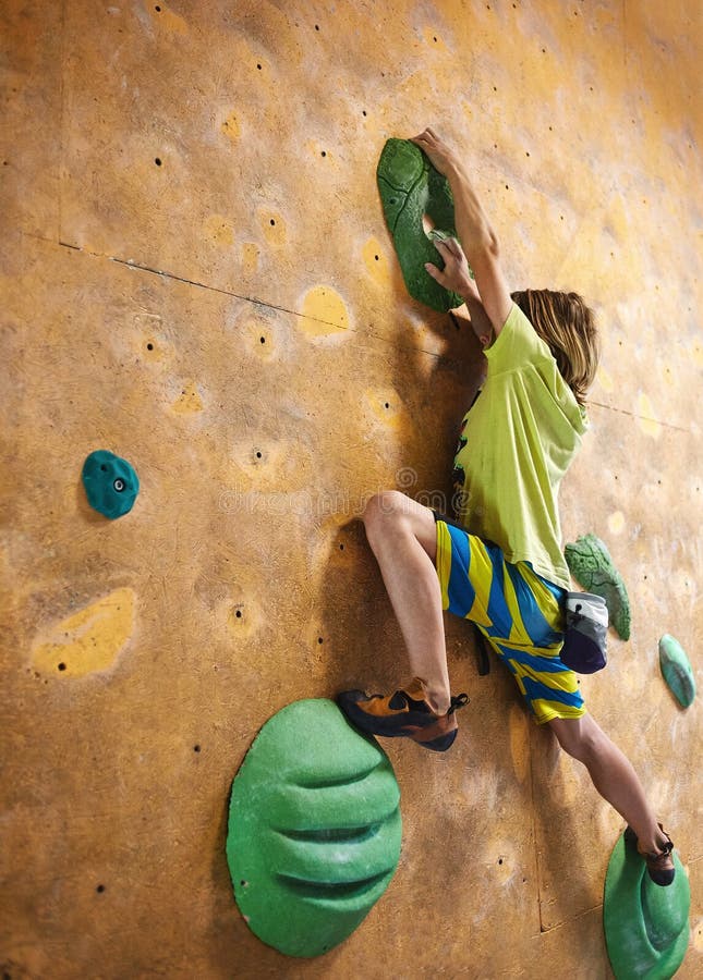 Boy climber climbs indoors royalty free stock photos Boy climber climbs indoors royalty free stock photos