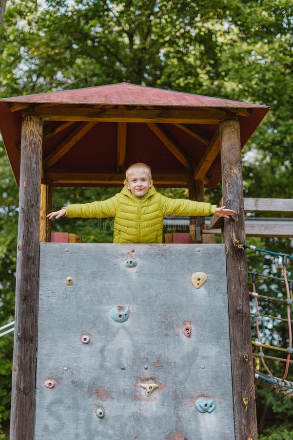 Boy at the Climbing Wall without a Helmet, Danger at the Climbing Wall