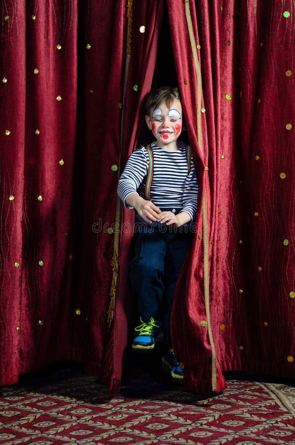 Boy Clown Jumping through Stage Curtains Stock Image - Image of excited ...