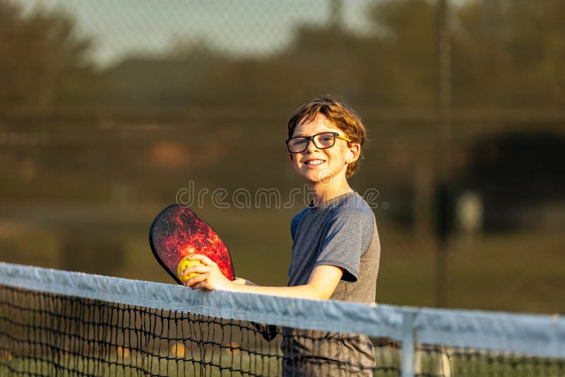 Boy on Court with Pickleball Gear Stock Photo Image of hitting