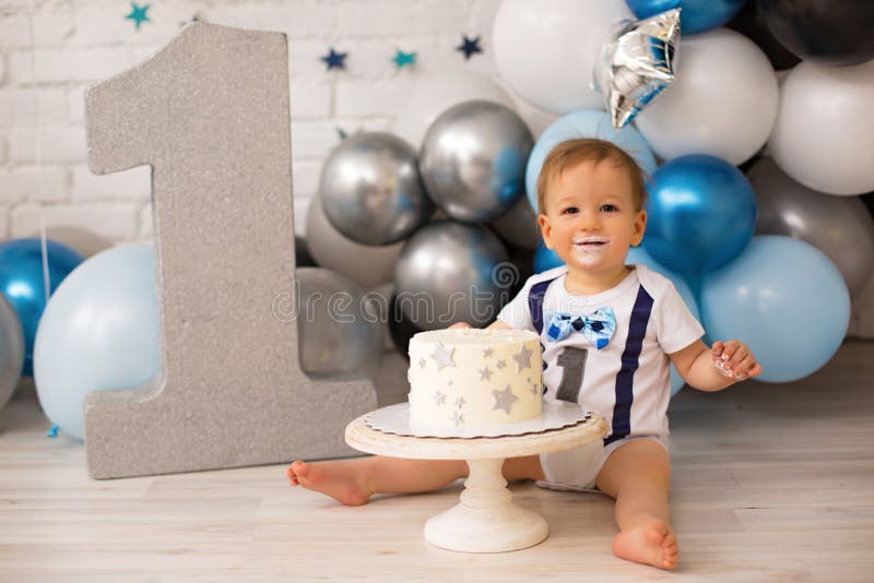Boy crash first smash cake royalty free stock photography