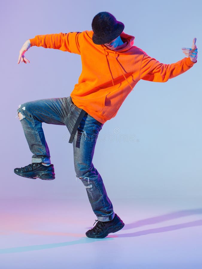 Boy Dancing Contemporary Dance in Studio. Breakdancing. Stock Photo