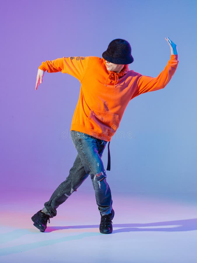 Boy Dancing Contemporary Dance in Studio. Breakdancing. Stock Photo