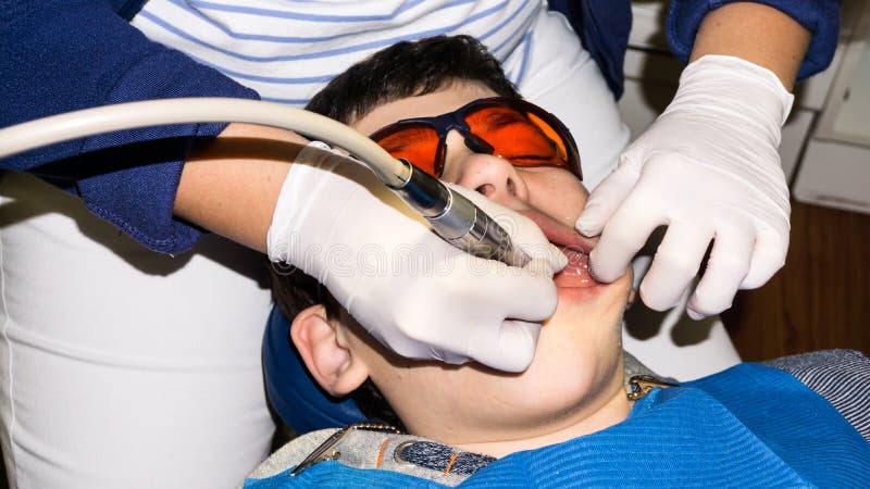 Boy in dental treatment. brace. health care stock photo Boy in dental treatment. brace. health care stock photo
