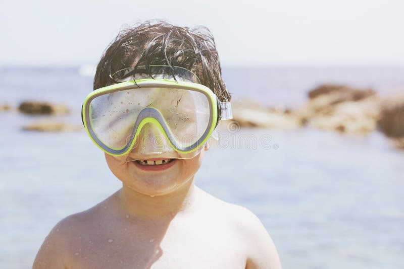 Boy with diving goggles stock image. Image of nature 99836571