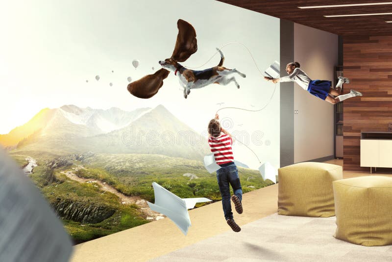 Boy with a Dog Flying through the Air with His Ears Stock Image Image