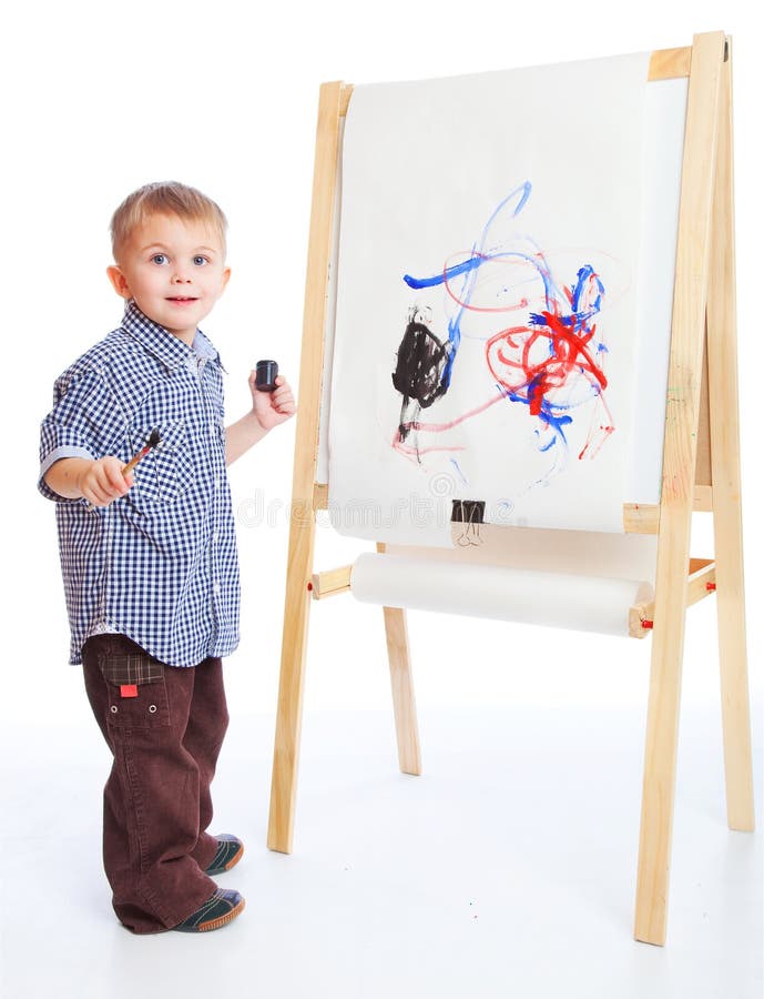 A boy draw on a blackboard