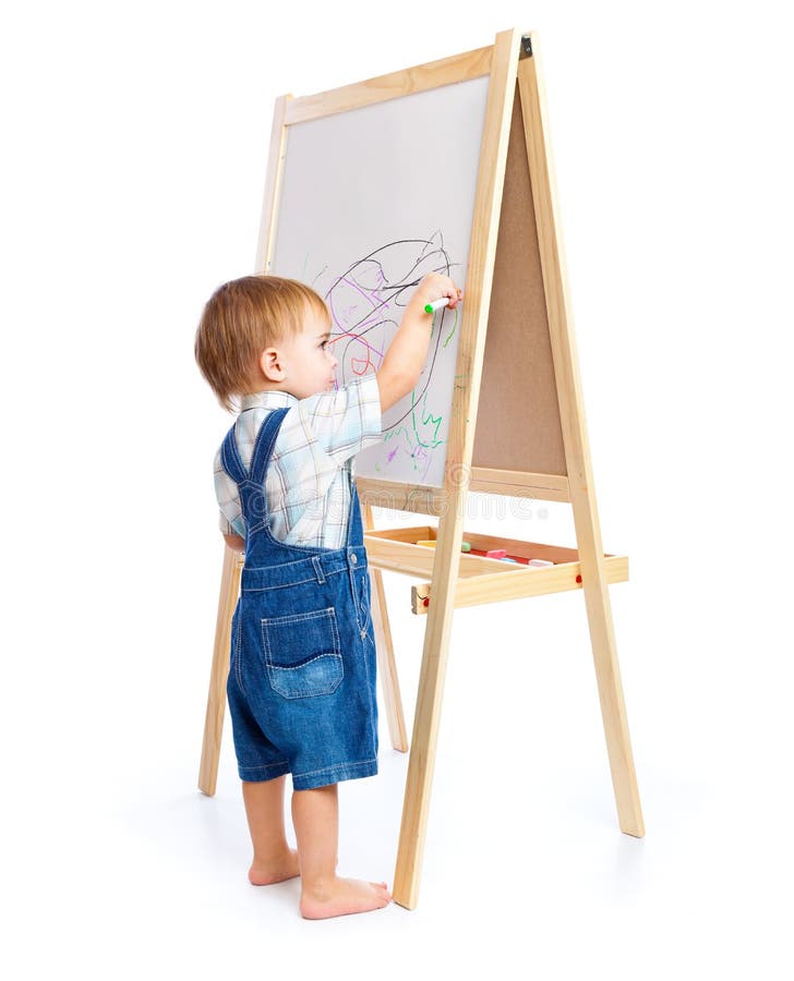 A boy is drawing on a blackboard