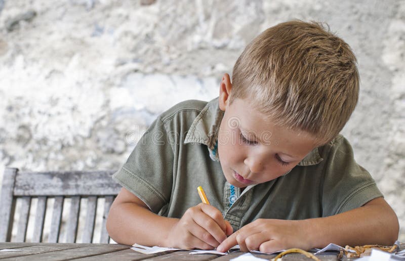 Boy drawing stock photo Boy drawing stock photo