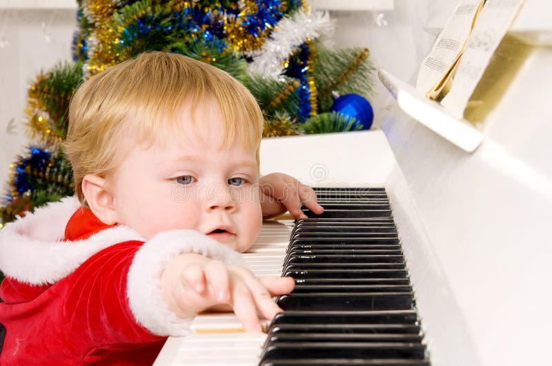 Boy dressed as Santa Claus