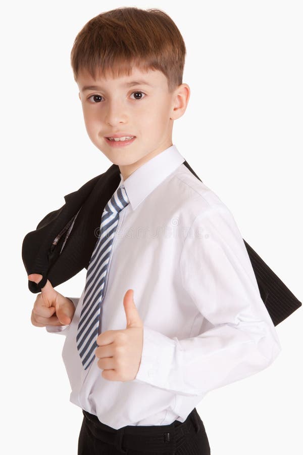 Boy dressed in tie and jacket