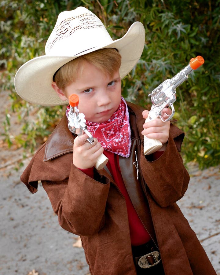 Boy Dressing Up As Cowboy stock image. Image of holiday 29057179