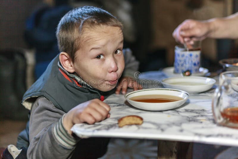 The Boy Drinks Tea from a Saucer Stock Image Image of sugar, couch