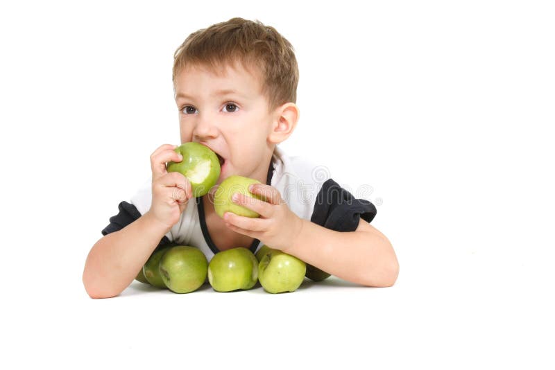Boy eating apples stock photo. Image of infant, male 12327296