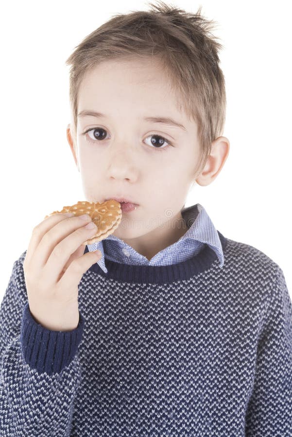 Cute Little Boy Eating Delicious Cookie Isolated Stock Photo Image of