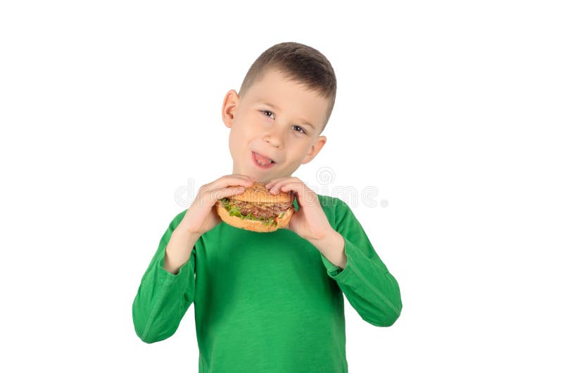 Boy eating burger stock photo. Image of burger, caucasian 145289368