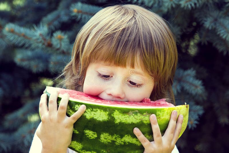 Boy eating watermelon stock image. Image of eating, smiling 77267631