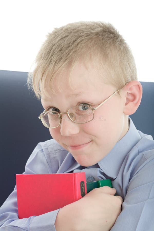 Boy in eyeglasses embrace three interesting books