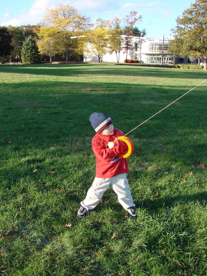 Boy Flies a Kite