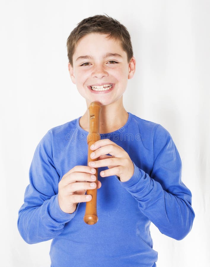 Boy with flute stock image. Image of rehearsing, child 42100231