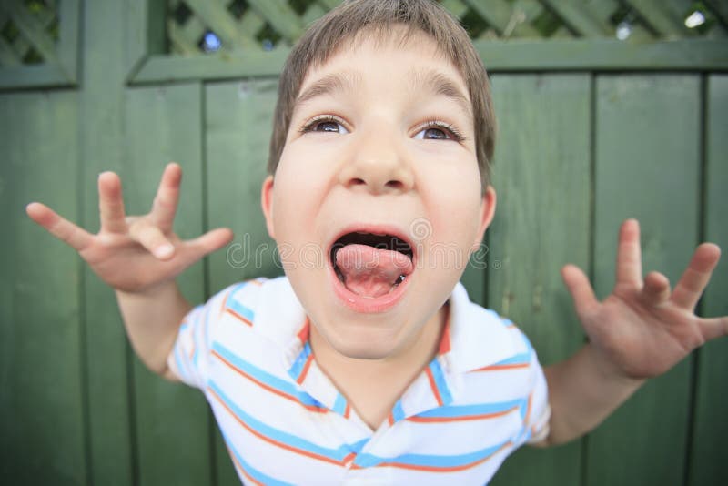 Boy with a Funny Face Expression Stock Image Image of closeup
