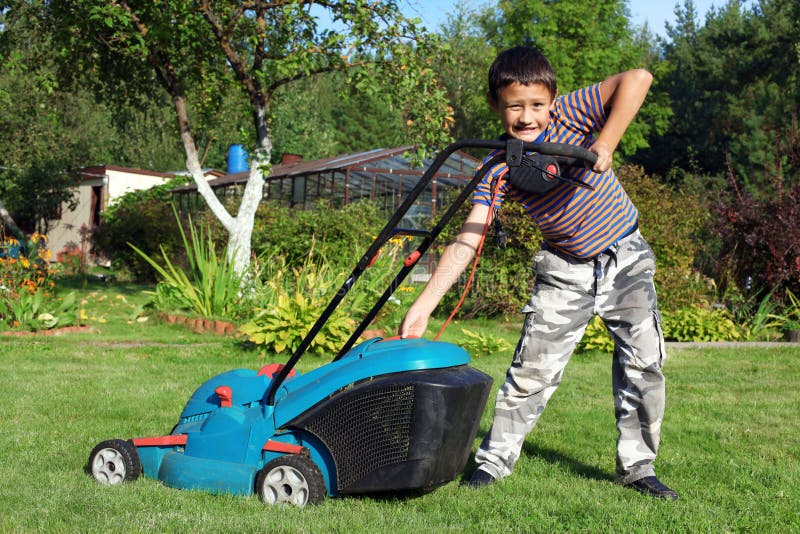 Boy Gardener Mowing The Lawn Stock Image - Image of growth, cutter