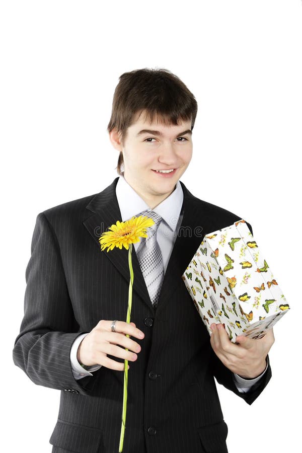 Boy with a gift on the white background