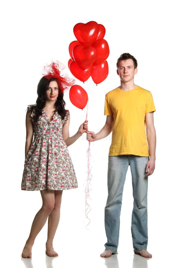 Boy and girl with balloons stock image. Image of hearts 24648817