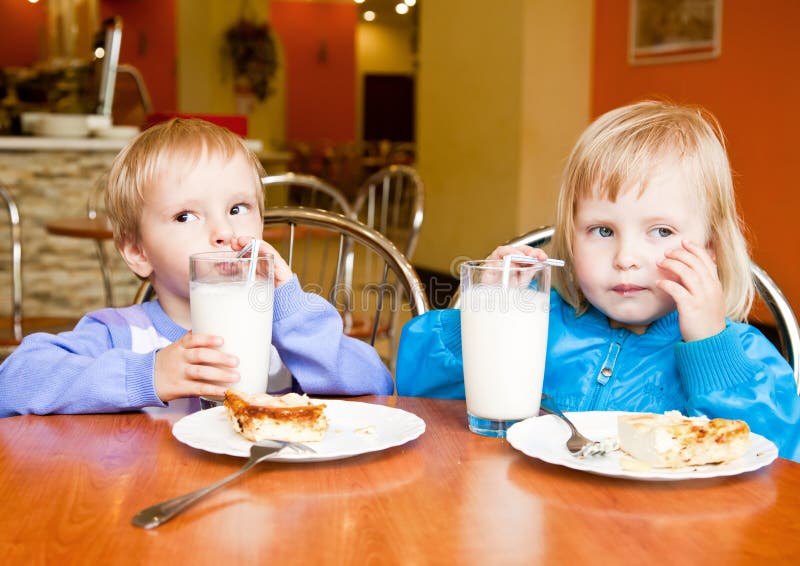 Boy and girl in the cafe stock photography Boy and girl in the cafe stock photography