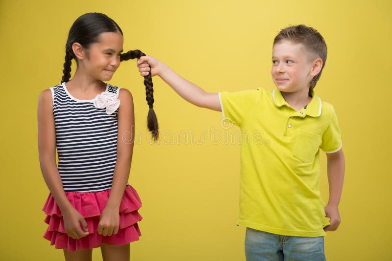 Little Girl Pulling Up Her Shirt