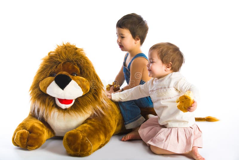 Boy, Girl and Lion stock photo. Image of cheerful, game 7076494