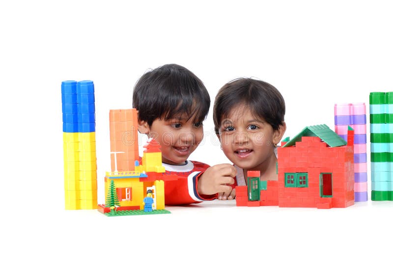 Boy and girl playing with blocks