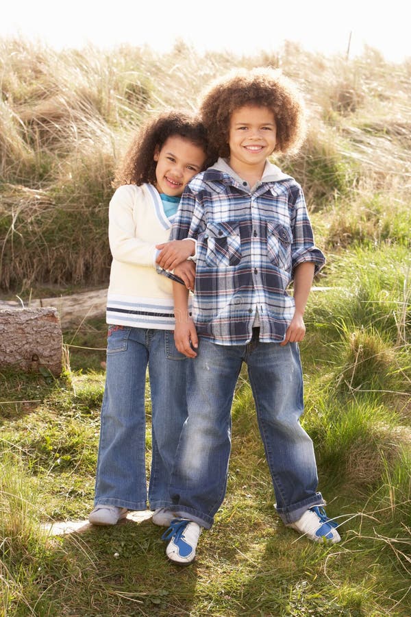 Little Boy Hugging a Pretty Girl. Love Concept Stock Photo - Image of ...