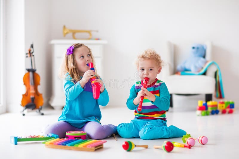 boy girl playing flute children music instruments musical education kids colorful wooden art toys little play music 63636058