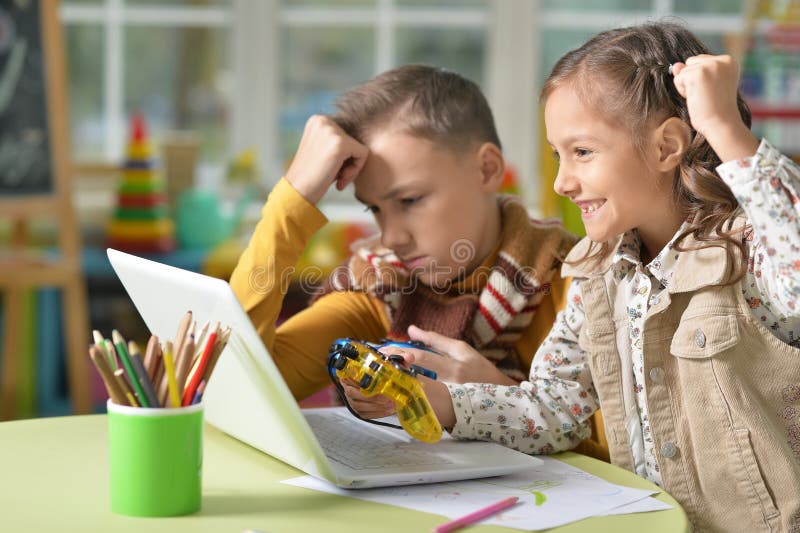 Boy and girl playing stock image. Image of browsing, cheerful 86373363