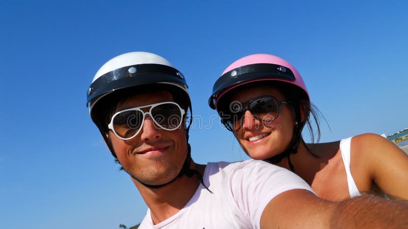 Boy and girl on scooter stock images Boy and girl on scooter stock images