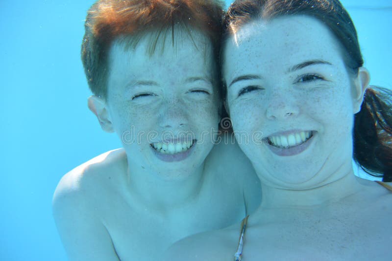Boy and Girl underwater royalty free stock photo Boy and Girl underwater royalty free stock photo