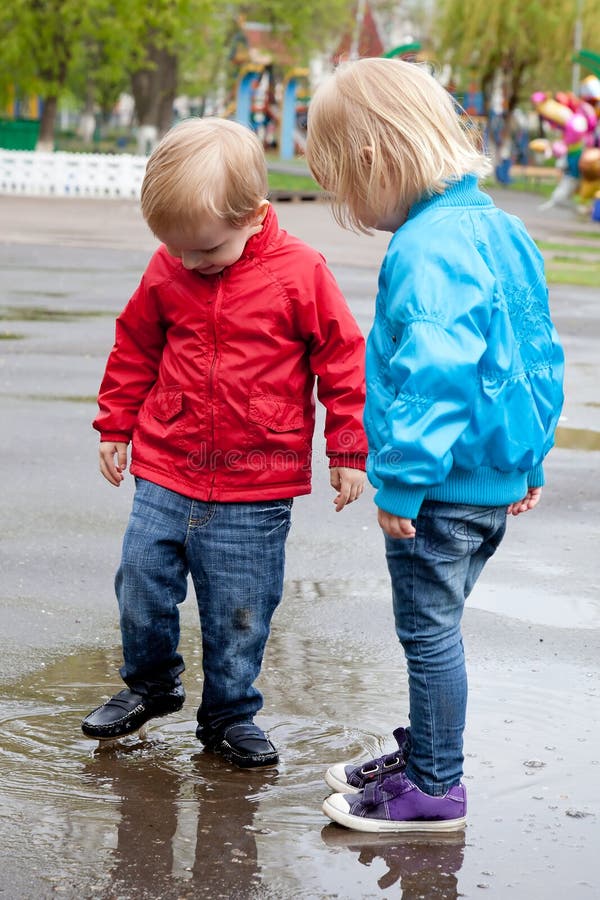 Boy with girl are walking on the street